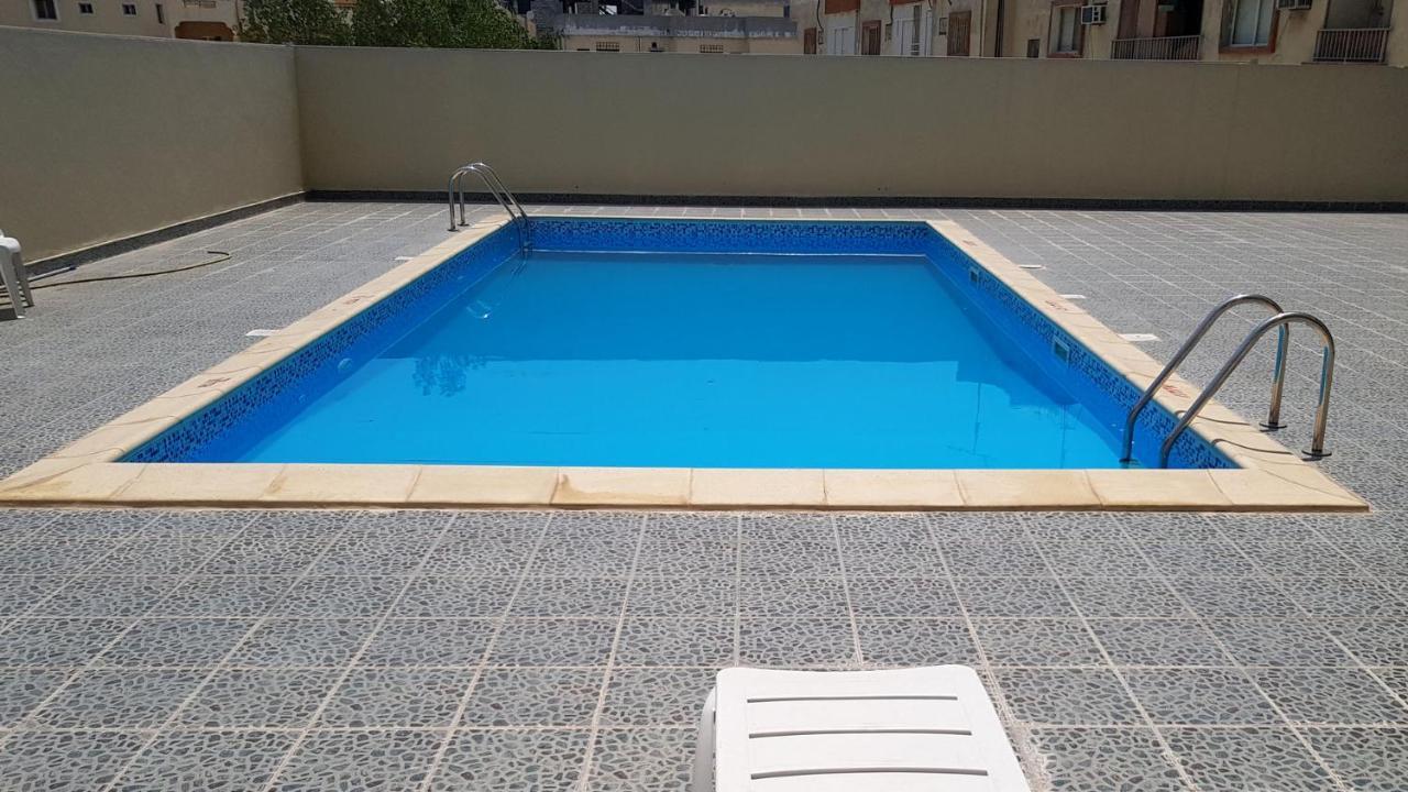 Al Muntazah Plaza Hotel Доха Экстерьер фото
